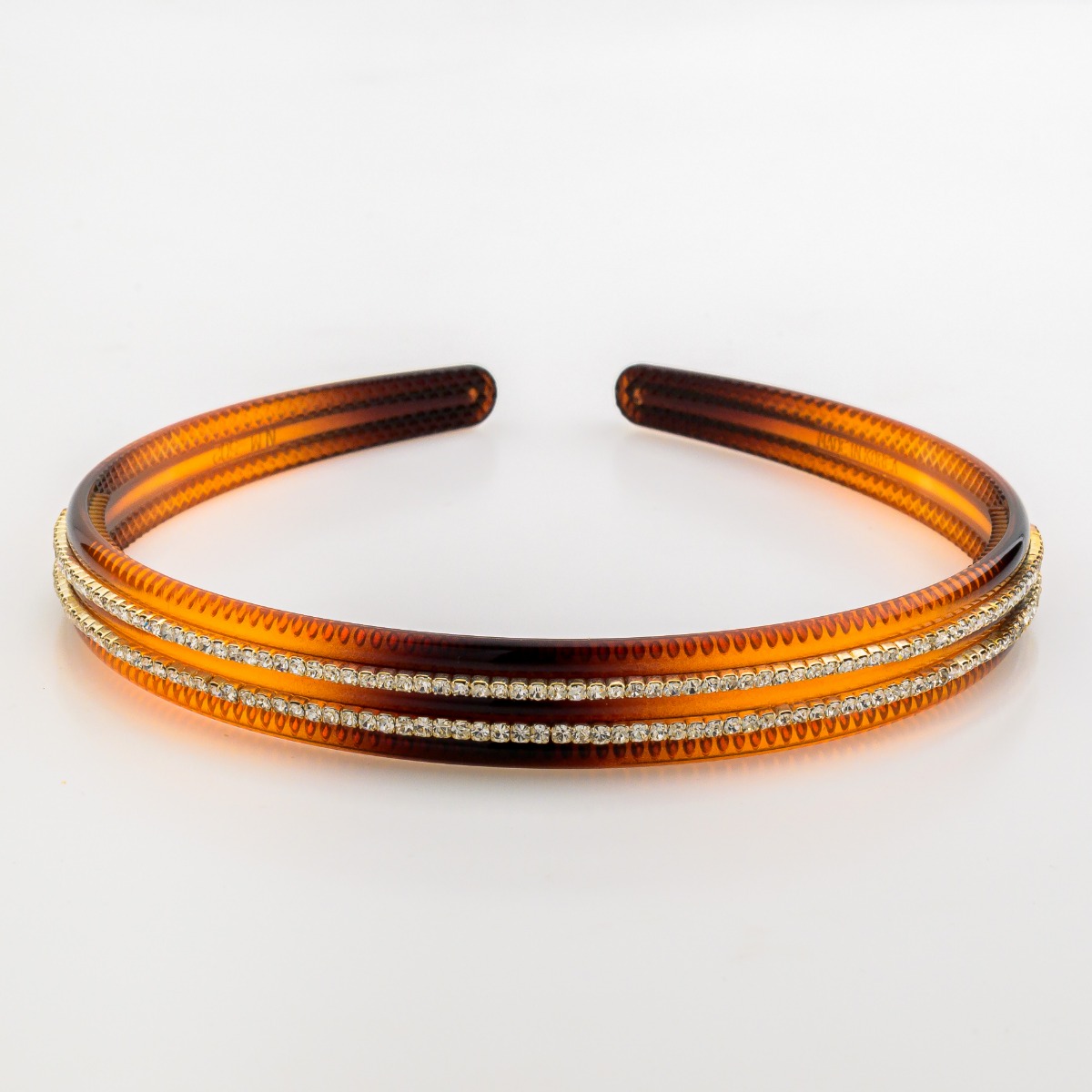 Στέκα πλαστική πλακέ σε καφέ και μαύρο χρώμα διακοσμημένη με 2 σειρές απο στράς-1