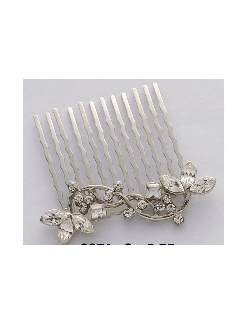 Χτενάκι μεταλλικό σε ασημί χρώμα διακοσμημένο με φύλλα και λεπτομέρειες με λευκά στράς