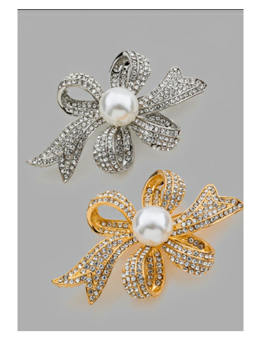  Καρφίτσα σε σχήμα φιόγκου, διακοσμημένη με στρας και μια πέρλα στο κέντρο