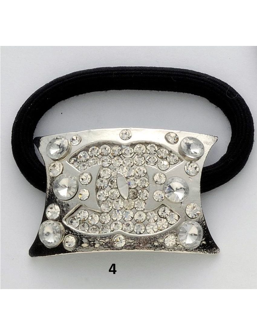 Λάστιχο με μεταλλικό διακοσμητικό και στράς σε 4 σχέδια