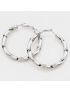 Σκουλαρίκια “Twist Hoops”